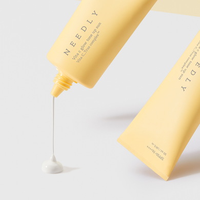 Солнцезащитный крем с эффектом осветления и сияния Needly Vita C Glow Tone Up Sun SPF 50+ PA++++, 50 мл Купить  оптом в Украине